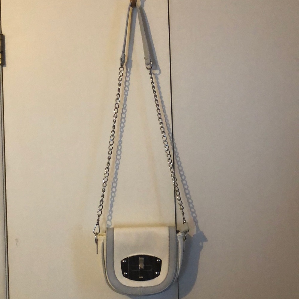 White/gray/tan interior Charming Charlie clutch